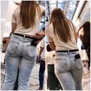 Older sister with a clear V-shaped line on the denim butt